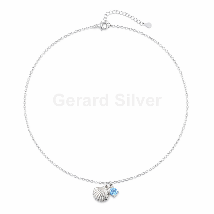 Colar de prata banhada a ródio com zircônias cúbicas e concha. 